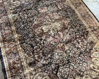This lot features a handcrafted 100% satin pile Agra rug, made in India that measures, 75” H x 49” W.

