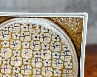 This lot features a studio pottery charger by listed Oregon artist, Jeff Proctor. Signed on the verso and measures, 10” H x 10” W.

