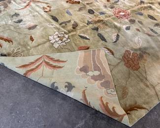 This lot features a rather unique hand-knotted wool rug that measures, 110” H x 72” W.

