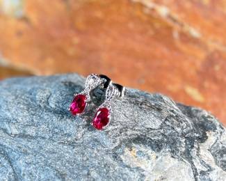 This lot features a pair of ruby and diamond ribbon stud earrings designed by, Sonia Hou. SONIA, a Los Angeles based Chinese American jewelry designer and fashion enthusiast, always had trouble finding stylish, reasonably priced jewelry that was safe on her skin and long-lasting in the sense that it will not easily flake. She would shop at major retailers and overspend on jewelry made out of cheap metals that would cause her allergic skin reactions.

