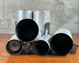 This lot features a set of six (6) cylindrical pendant lights, manufactured by Lightolier. The four larger lights measures, 8.5” H x 4” W x 4” D and the two smaller measure, 7” H x 3” W x 3” D. These lights could use some minor restoration prior to use. A beautiful set of authentic mid-century modern lighting. Lightolier was founded in 1904 by Bernhard Blitzer. Its original name was the New York Gas and Appliance Co., but it was changed to Lightolier, a combination of “light” and “chandelier, ” when electric lighting became more widely accepted.

