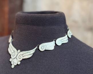 This lot features a gorgeous set of Taxco jewelry with sterling silver and inlaid blue stone with a marble-like appearance. The necklace measures, 17” and the bracelet, 7”. All items bear a maker’s mark as shown in photos with a total approx. weight of 58.00 grams.

