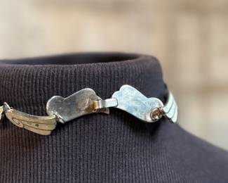 This lot features a gorgeous set of Taxco jewelry with sterling silver and inlaid blue stone with a marble-like appearance. The necklace measures, 17” and the bracelet, 7”. All items bear a maker’s mark as shown in photos with a total approx. weight of 58.00 grams.

