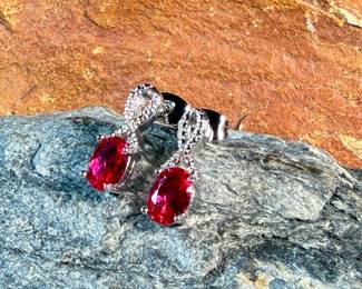 This lot features a pair of ruby and diamond ribbon stud earrings designed by, Sonia Hou. SONIA, a Los Angeles based Chinese American jewelry designer and fashion enthusiast, always had trouble finding stylish, reasonably priced jewelry that was safe on her skin and long-lasting in the sense that it will not easily flake. She would shop at major retailers and overspend on jewelry made out of cheap metals that would cause her allergic skin reactions.

