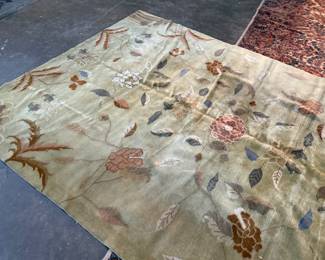 This lot features a rather unique hand-knotted wool rug that measures, 110” H x 72” W.

