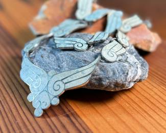 This lot features a gorgeous set of Taxco jewelry with sterling silver and inlaid blue stone with a marble-like appearance. The necklace measures, 17” and the bracelet, 7”. All items bear a maker’s mark as shown in photos with a total approx. weight of 58.00 grams.

