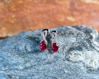 This lot features a pair of ruby and diamond ribbon stud earrings designed by, Sonia Hou. SONIA, a Los Angeles based Chinese American jewelry designer and fashion enthusiast, always had trouble finding stylish, reasonably priced jewelry that was safe on her skin and long-lasting in the sense that it will not easily flake. She would shop at major retailers and overspend on jewelry made out of cheap metals that would cause her allergic skin reactions.

