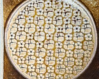 This lot features a studio pottery charger by listed Oregon artist, Jeff Proctor. Signed on the verso and measures, 10” H x 10” W.

