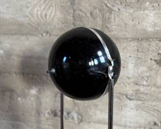 This lot features an iconic mid-century modern space age "eyeball" floor lamp in working condition, circa 1960s. Minor "patina" with age as shown in photos and measures, 52” H.

