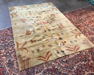 This lot features a rather unique hand-knotted wool rug that measures, 110” H x 72” W.

