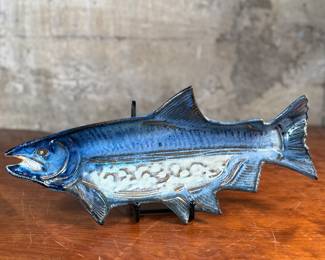 This lot features a fish tray by Blue Spruce Pottery. Signed on the verso and measures, 2” H x 15.5” W x 7” D. Minor repair done to a fin as shown.

