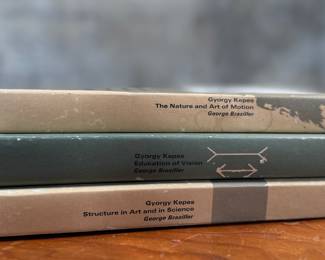 This lot features a set of three hardcover books, edited by Gyorgy Kepes and published in 1965 as part of the Vision + Value series. György Kepes (1906-2001) was a Hungarian-American artist, educator, and designer known for bridging art, science, and technology, founding the Center for Advanced Visual Studies (CAVS) at MIT, and exploring visual culture through photography, painting, and large-scale light installations.

