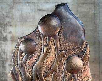 This lot features a stunning artist proof sculpture by listed artist, John Richen. Signed as shown in photos, circa 1995. This sculpture measures, 29” H x 16” W x 8” D. John Matthew Richen has been a professional sculptor since graduating from Oregon State University in 1970. His expertise in metal fabrication brought him immediate acknowledgement from the international art world. In the late 90’s he designed his studio in Borrego Springs, California, a small peaceful community that provides year-round work conditions and inspiration from the desert landscape. In addition to bronze, stainless steel and aluminum this innovative sculptor also incorporates Cor-ten steel, granite, fused glass, water and lighting into selected works.

