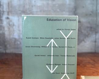 This lot features a set of three hardcover books, edited by Gyorgy Kepes and published in 1965 as part of the Vision + Value series. György Kepes (1906-2001) was a Hungarian-American artist, educator, and designer known for bridging art, science, and technology, founding the Center for Advanced Visual Studies (CAVS) at MIT, and exploring visual culture through photography, painting, and large-scale light installations.

