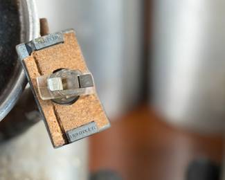 This lot features a set of six (6) cylindrical pendant lights, manufactured by Lightolier. The four larger lights measures, 8.5” H x 4” W x 4” D and the two smaller measure, 7” H x 3” W x 3” D. These lights could use some minor restoration prior to use. A beautiful set of authentic mid-century modern lighting. Lightolier was founded in 1904 by Bernhard Blitzer. Its original name was the New York Gas and Appliance Co., but it was changed to Lightolier, a combination of “light” and “chandelier, ” when electric lighting became more widely accepted.

