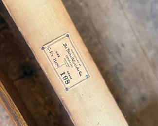 This lot features a stacking barrister bookcase manufactured by Globe Wernicke, dating back to the early 1900s. This bookcase in particular has a total of seven (7) pieces – 5 stacking bookcases, a base, and a topper. This piece measures from top to bottom, 75” H x 34” W x 11” D.

