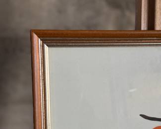 "Persimmons", a limited edition lithograph by listed artist, Henry Evans. Edition 62/450 and signed in pencil circa 1981. Professionally framed and measures in frame, 21” H x 14” W. Henry Evans (1918-1990) was a San Francisco Bay Area artist and printmaker known for his minimalist style botanical images. In 1949 he established the Peregrine Press in San Francisco where he began making books and prints for local Bay Area artists.

