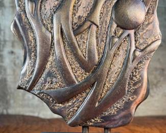 This lot features a stunning artist proof sculpture by listed artist, John Richen. Signed as shown in photos, circa 1995. This sculpture measures, 29” H x 16” W x 8” D. John Matthew Richen has been a professional sculptor since graduating from Oregon State University in 1970. His expertise in metal fabrication brought him immediate acknowledgement from the international art world. In the late 90’s he designed his studio in Borrego Springs, California, a small peaceful community that provides year-round work conditions and inspiration from the desert landscape. In addition to bronze, stainless steel and aluminum this innovative sculptor also incorporates Cor-ten steel, granite, fused glass, water and lighting into selected works.

