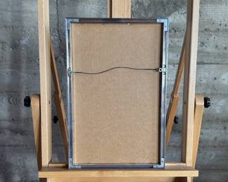 "Marguerite", a limited edition lithograph by listed artist, Henry Evans. Edition 136/175 and signed in pencil circa 1977. Measures in frame, 20” H x 13” W. Henry Evans (1918-1990) was a San Francisco Bay Area artist and printmaker known for his minimalist style botanical images. In 1949 he established the Peregrine Press in San Francisco where he began making books and prints for local Bay Area artists.

