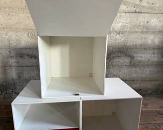 This lot features a set of three (3) modular storage cubes from Finland company, Palaset. Designed by Ristomatti Ratia, the son of Marimekko’s founder, Armi Ratia. Fabricated from a hard, durable polystyrene, this versatile system is ideal for offices, playrooms, and mudrooms, yet easily stylish enough for the living room. Each cube measures, 13.5” H x 13.5” W x 13.5” D.

