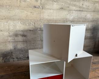 This lot features a set of three (3) modular storage cubes from Finland company, Palaset. Designed by Ristomatti Ratia, the son of Marimekko’s founder, Armi Ratia. Fabricated from a hard, durable polystyrene, this versatile system is ideal for offices, playrooms, and mudrooms, yet easily stylish enough for the living room. Each cube measures, 13.5” H x 13.5” W x 13.5” D.

