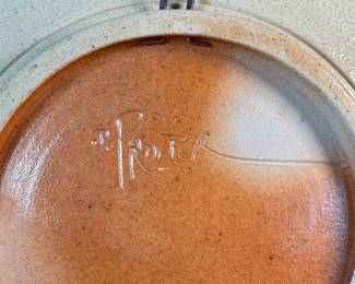 This lot features a studio pottery charger by listed Oregon artist, Jeff Proctor. Signed on the verso and measures, 10” H x 10” W.

