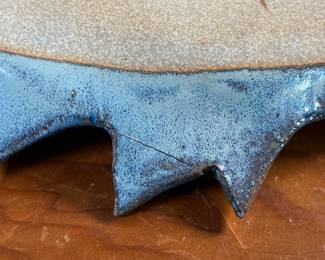 This lot features a fish tray by Blue Spruce Pottery. Signed on the verso and measures, 2” H x 15.5” W x 7” D. Minor repair done to a fin as shown.


