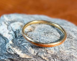 This lot features an antique baby bracelet, made of 5k gold and is engraved with the name, "Mary". Total approx. weight of 5.00 grams.

