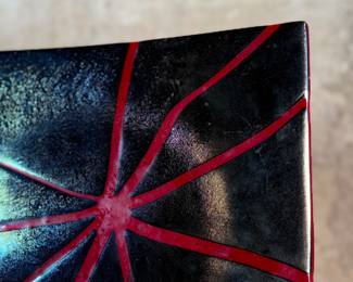 This lot features a stunning studio art glass tray. signed by the Aquila Art Glass Studio out of St. Helens, Oregon. This piece measures, 14” H x 14” W.

