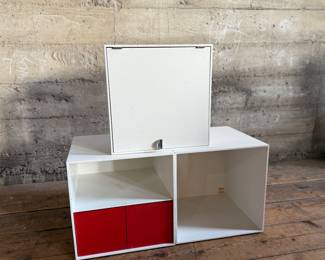 This lot features a set of three (3) modular storage cubes from Finland company, Palaset. Designed by Ristomatti Ratia, the son of Marimekko’s founder, Armi Ratia. Fabricated from a hard, durable polystyrene, this versatile system is ideal for offices, playrooms, and mudrooms, yet easily stylish enough for the living room. Each cube measures, 13.5” H x 13.5” W x 13.5” D.

