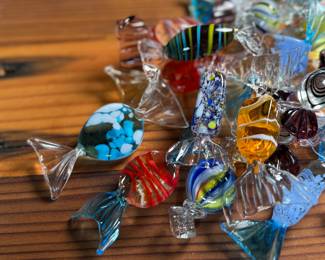 This lot features a large collection of Murano blown glass candy. Majority are in very good condition, some still with maker sticks as seen in photos.

