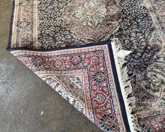 This lot features a handcrafted 100% satin pile Agra rug, made in India that measures, 75” H x 49” W.

