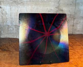 This lot features a stunning studio art glass tray. signed by the Aquila Art Glass Studio out of St. Helens, Oregon. This piece measures, 14” H x 14” W.

