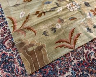 This lot features a rather unique hand-knotted wool rug that measures, 110” H x 72” W.

