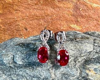 This lot features a pair of ruby and diamond ribbon stud earrings designed by, Sonia Hou. SONIA, a Los Angeles based Chinese American jewelry designer and fashion enthusiast, always had trouble finding stylish, reasonably priced jewelry that was safe on her skin and long-lasting in the sense that it will not easily flake. She would shop at major retailers and overspend on jewelry made out of cheap metals that would cause her allergic skin reactions.

