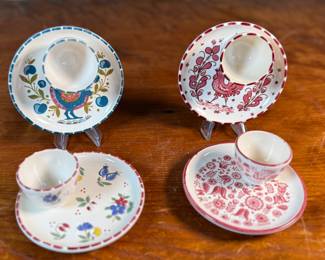 This lot features a set of four (4) hand-painted ceramic egg cups & saucers made by Peasant Village (PV) Italy, featuring the traditional Italian "Orvieto" or "Galletto" designs. Signed underneath as shown in photos.

