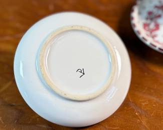 This lot features a set of four (4) hand-painted ceramic egg cups & saucers made by Peasant Village (PV) Italy, featuring the traditional Italian "Orvieto" or "Galletto" designs. Signed underneath as shown in photos.

