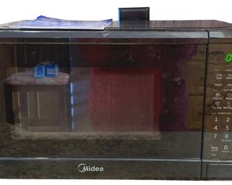 70 - Midea Microwave - 17 x 12 x 10 used as-is electric/electronic/mechanical item - no guarantee all components, untested.

