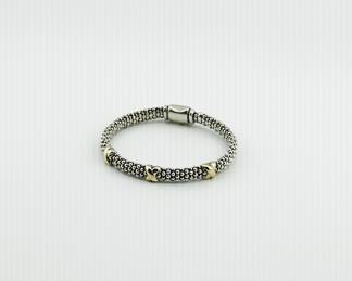 Lagos Triple X 18K & Sterling caviar Embrace Bracelet. 