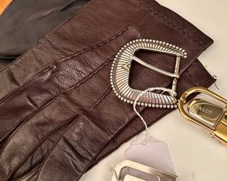 Designer men’s  leather gloves and belt buckles 