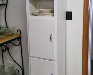 Vintage kitchen cabinet with arched top