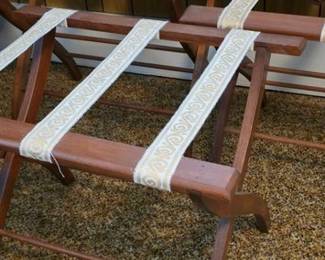 Three vintage luggage racks