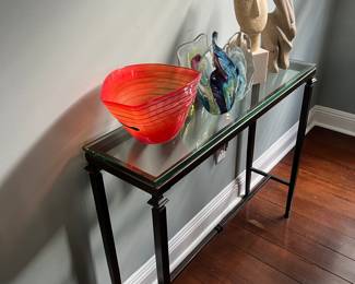 variety of art glass and statuettes