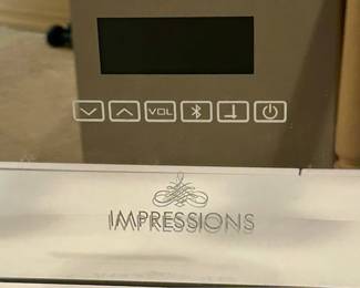 Blue Tooth technology, embedded speaker system, light dimming, time and weather report functions