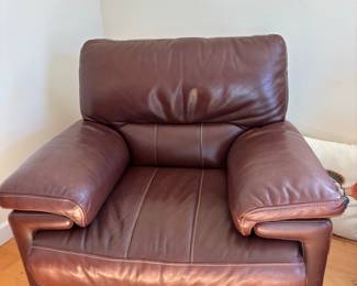 $200, motorized leather reclining chair. Could be purchased with the adjoining leather couch set for $600. 
