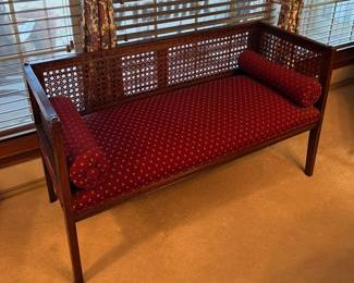 beautiful bench with wicker back