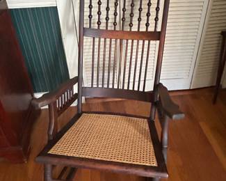 Antique Spindle-back rocking chair with caned seat...very unusual!