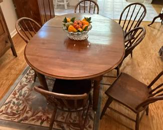 Antique walnut dining room set with 6 chairs.  Beautiful finish.  $500