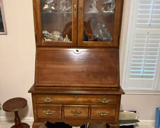 Secretary desk - $100.  Collection of dolphin figurines $100 for all.