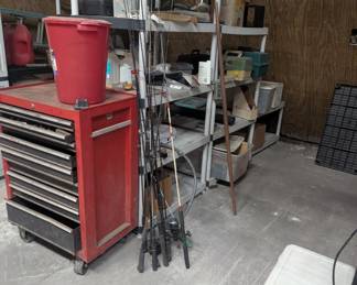 Tool box, fishing poles, coolers, plastic shelving.